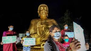 Bhopal: Devotees wearing masks offer prayers on the eve of Buddha Purnima, during the ongoing nationwide COVID-19 lockdown, in Bhopal, Wednesday, May 6, 2020.(PTI) Bhopal: Devotees wearing masks offer prayers on the eve of Buddha Purnima, during the ongoing nationwide COVID-19 lockdown, in Bhopal, Wednesday, May 6, 2020.(PTI)