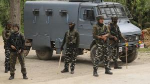 Security forces near the site of a gunfight in which Hizbul Mujahideen commander Riyaz Naikoo along with an associate were killed, in Beighpora area, Pulwama district, Jammu and Kashmir on Wednesday.(Waseem Andrabi/HT Photo) Security forces near the site of a gunfight in which Hizbul Mujahideen commander Riyaz Naikoo along with an associate were killed, in Beighpora area, Pulwama district, Jammu and Kashmir on Wednesday.(Waseem Andrabi/HT Photo)