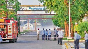 Firefighters stand outside the LG Polymers factory as styrene vapours linger at a distance(PTI Photo) Firefighters stand outside the LG Polymers factory as styrene vapours linger at a distance(PTI Photo)
