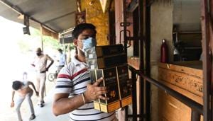 A man returns after buying alcohol from a liquor shop in Najafgarh, New Delhi.(Vipin Kumar/HT Photo) A man returns after buying alcohol from a liquor shop in Najafgarh, New Delhi.(Vipin Kumar/HT Photo)