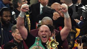 (FILES) In this file photo taken on February 22, 2020 British boxer Tyson Fury celebrates after defeating US boxer Deontay Wilder.(AFP) (FILES) In this file photo taken on February 22, 2020 British boxer Tyson Fury celebrates after defeating US boxer Deontay Wilder.(AFP)