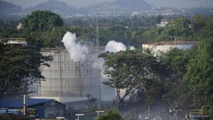 Smoke rises from LG Polymers plant, the site of a chemical gas leakage, in Vishakhapatnam on Thursday.(AP Photo) Smoke rises from LG Polymers plant, the site of a chemical gas leakage, in Vishakhapatnam on Thursday.(AP Photo)