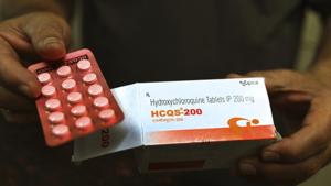 A chemist displays hydroxychloroquine tablets in New Delhi. The findings come two weeks after the US Food and Drug Administration warned the public against using hydroxychloroquine and chloroquine without prescription.(AP File Photo) A chemist displays hydroxychloroquine tablets in New Delhi. The findings come two weeks after the US Food and Drug Administration warned the public against using hydroxychloroquine and chloroquine without prescription.(AP File Photo)