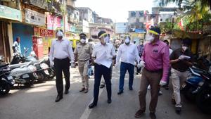 Officials of Brihanmumbai Municipal Corporation (BMC) visit Dharavi slums during the nationwide Covid-19 lockdown, in Mumbai, on Tuesday.(PTI Photo) Officials of Brihanmumbai Municipal Corporation (BMC) visit Dharavi slums during the nationwide Covid-19 lockdown, in Mumbai, on Tuesday.(PTI Photo)