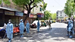Paramilitary force wearing protective gear patrolling in a street during nationwide lockdown to slow the spreading of coronavirus disease, in Ahmedabad, Gujarat, May 7, 2020.(ANI) Paramilitary force wearing protective gear patrolling in a street during nationwide lockdown to slow the spreading of coronavirus disease, in Ahmedabad, Gujarat, May 7, 2020.(ANI)
