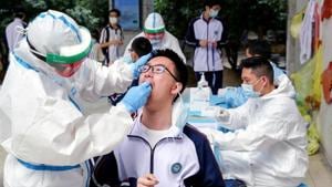 The city of Wuhan in Hubei province reported five new cases on Monday, a day after it confirmed the first Covid-19 case since the first week of April.(REUTERS PHOTO.) The city of Wuhan in Hubei province reported five new cases on Monday, a day after it confirmed the first Covid-19 case since the first week of April.(REUTERS PHOTO.)