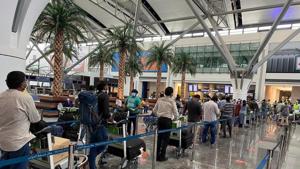 Indians queuing up at the Oman International Airport to board the flight back home as part of the ‘Vande Bharat’ mission on Tuesday.(ANI photo) Indians queuing up at the Oman International Airport to board the flight back home as part of the ‘Vande Bharat’ mission on Tuesday.(ANI photo)