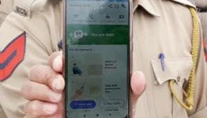 A police personnel in Jammu and Kashmir displays the Aarogya sSetu aap after installing on their mobile phone in Reasi in this file photo.(ANI Photo) A police personnel in Jammu and Kashmir displays the Aarogya sSetu aap after installing on their mobile phone in Reasi in this file photo.(ANI Photo)