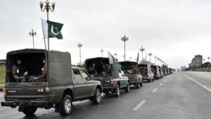 Pakistan's national flags flatter on an Army convey patrolling during a partial lockdown after Pakistan shut all markets, public places and discouraged large gatherings amid an outbreak of coronavirus disease (COVID-19), in Islamabad, Pakistan March 24, 2020.(REUTERS) Pakistan's national flags flatter on an Army convey patrolling during a partial lockdown after Pakistan shut all markets, public places and discouraged large gatherings amid an outbreak of coronavirus disease (COVID-19), in Islamabad, Pakistan March 24, 2020.(REUTERS)