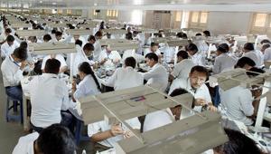 Workers polishing diamonds at Samarth Diamond's factory in Gujarat, India.(via REUTERS) Workers polishing diamonds at Samarth Diamond's factory in Gujarat, India.(via REUTERS)