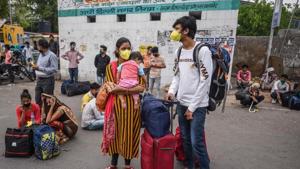 Passengers were seen waiting outside the New Delhi railway station to board the special trains. ( Biplov Bhuyan) Passengers were seen waiting outside the New Delhi railway station to board the special trains. ( Biplov Bhuyan)