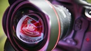 A LED board showing the Bundesliga logo is reflected in a lens prior to the Bundesliga match.(Bongarts/Getty Images) A LED board showing the Bundesliga logo is reflected in a lens prior to the Bundesliga match.(Bongarts/Getty Images)