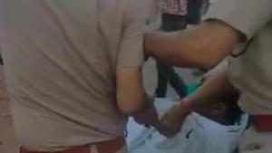 UP Congress president Ajay Kumar Lallu being taken away by the police. UP Congress president Ajay Kumar Lallu being taken away by the police.