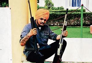 Hailing from Moosa, a remote village in Mansa, Moose Wala has emerged as king of controversies, especially for promoting violence and gun culture in his songs.(HT Photo) Hailing from Moosa, a remote village in Mansa, Moose Wala has emerged as king of controversies, especially for promoting violence and gun culture in his songs.(HT Photo)