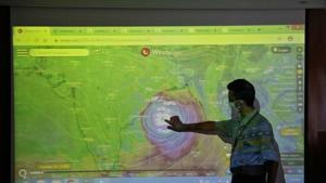 A scientist at India Meteorological Department points to a section of the screen showing the position of the Cyclone Amphan, on Tuesday.(Reuters Photo) A scientist at India Meteorological Department points to a section of the screen showing the position of the Cyclone Amphan, on Tuesday.(Reuters Photo)