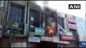 Twelve fire tenders are present at the spot and are trying to extinguish the fire.(ANI/Twitter) Twelve fire tenders are present at the spot and are trying to extinguish the fire.(ANI/Twitter)