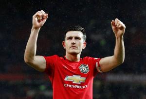 FILE PHOTO: Soccer Football - Premier League - Manchester United v Manchester City - Old Trafford, Manchester, Britain - March 8, 2020 Manchester United's Harry Maguire celebrates after the match REUTERS/Phil Noble/File Photo(REUTERS) FILE PHOTO: Soccer Football - Premier League - Manchester United v Manchester City - Old Trafford, Manchester, Britain - March 8, 2020 Manchester United's Harry Maguire celebrates after the match REUTERS/Phil Noble/File Photo(REUTERS)