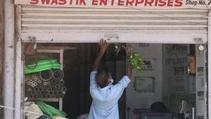 A talisman vendor goes around the market tying lemons and chillies at the entrances to shops that opened after relaxations in lockdown, in Jaipur, Rajasthan, India on Tuesday, May 19, 2020.(Photo by Himanshu Vyas/Hindustan Times) A talisman vendor goes around the market tying lemons and chillies at the entrances to shops that opened after relaxations in lockdown, in Jaipur, Rajasthan, India on Tuesday, May 19, 2020.(Photo by Himanshu Vyas/Hindustan Times)