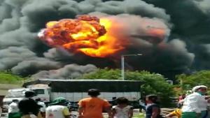A blanket of thick black smoke engulfed the area after the blaze.(ANI) A blanket of thick black smoke engulfed the area after the blaze.(ANI)