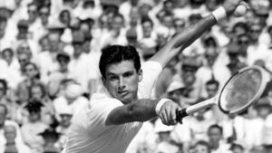 FILE - In this July 3, 1957, file photo, Australian tennis player Ashley Cooper leans forward to return service during his two-hour match against compatriot Neale Fraser at Wimbledon. Cooper, who won four Grand Slam singles titles including the Australian, Wimbledon and U.S. championships in 1958, has died. He was 83. Tennis Australia said Friday, May 22, 2020, that the former No. 1-ranked player and long-time administrator had died after a long illness. ((AP Photo/File)(AP) FILE - In this July 3, 1957, file photo, Australian tennis player Ashley Cooper leans forward to return service during his two-hour match against compatriot Neale Fraser at Wimbledon. Cooper, who won four Grand Slam singles titles including the Australian, Wimbledon and U.S. championships in 1958, has died. He was 83. Tennis Australia said Friday, May 22, 2020, that the former No. 1-ranked player and long-time administrator had died after a long illness. ((AP Photo/File)(AP)