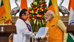 Prime Minister Narendra Modi (R) shakes hands with Sri Lankan Prime Minister Mahinda Rajapaksa after a joint statement at Hyderabad House, in New Delhi.(PTI/ File photo) Prime Minister Narendra Modi (R) shakes hands with Sri Lankan Prime Minister Mahinda Rajapaksa after a joint statement at Hyderabad House, in New Delhi.(PTI/ File photo)