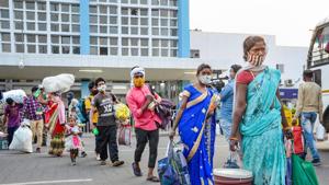 Ranchi: Migrants carrying their luggage walk to board buses for their homes after arriving from Jaipur by a Shramik special train, at Hatia Railway Station in Ranchi, Monday, May 18, 2020, amid ongoing COVID-19 lockdown. (PTI Photo) (PTI18-05-2020_000274B)(PTI) Ranchi: Migrants carrying their luggage walk to board buses for their homes after arriving from Jaipur by a Shramik special train, at Hatia Railway Station in Ranchi, Monday, May 18, 2020, amid ongoing COVID-19 lockdown. (PTI Photo) (PTI18-05-2020_000274B)(PTI)