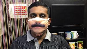 A digital photographer in Etumanoor in Kottayam, Binesh G Paul (38), has developed a unique mask to overcome this identity crisis.(HT PHOTO.) A digital photographer in Etumanoor in Kottayam, Binesh G Paul (38), has developed a unique mask to overcome this identity crisis.(HT PHOTO.)