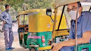 . Every mundane hint of activity has something magical, and so it is with Som Nath and his auto rickshaw. One change has to be noticed though: his driver’s uniform no longer comprise of just grey shirt and grey pants—but also of a mask.(HT Photo)