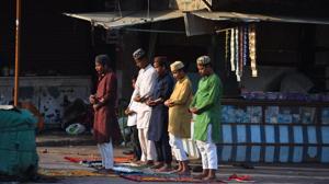 A group of boys offer prayers near a market on the eve of Eid-ul-Fitr at Jama Masjid in New Delhi on Sunday.(Raj K Raj/HT PHOTO) A group of boys offer prayers near a market on the eve of Eid-ul-Fitr at Jama Masjid in New Delhi on Sunday.(Raj K Raj/HT PHOTO)