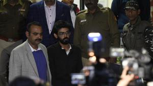 JNU student Sharjeel Imam is seen with Crime branch officials after he was arrested from Bihar, at Saket Police station, in New Delhi, on January 29, 2020.(Photo by Biplov Bhuyan / Hindustan Times) JNU student Sharjeel Imam is seen with Crime branch officials after he was arrested from Bihar, at Saket Police station, in New Delhi, on January 29, 2020.(Photo by Biplov Bhuyan / Hindustan Times)