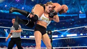 Ronda Rousey against Triple H.(WWE) Ronda Rousey against Triple H.(WWE)