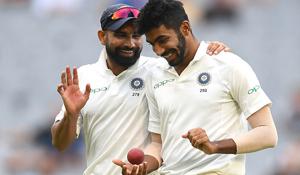 Mohammed Shami (L) and Jasprit Bumrah find something to smile about.(Getty Images) Mohammed Shami (L) and Jasprit Bumrah find something to smile about.(Getty Images)