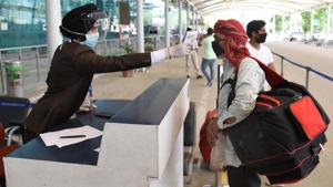 An employee thermal screens a passenger before allowing into Sri Guru Ramdas Jee International Airport in Amritsar, Punjab, India on Monday, May 25, 2020/ representative image.(Sameer Sehgal/Hindustan Times) An employee thermal screens a passenger before allowing into Sri Guru Ramdas Jee International Airport in Amritsar, Punjab, India on Monday, May 25, 2020/ representative image.(Sameer Sehgal/Hindustan Times)