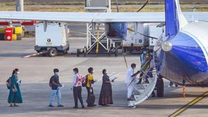 Passengers stand in a queue to board an Indigo plane for domestic travel, after flights resumed during the ongoing nationwide lockdown, at Chennai airport.(PTI) Passengers stand in a queue to board an Indigo plane for domestic travel, after flights resumed during the ongoing nationwide lockdown, at Chennai airport.(PTI)