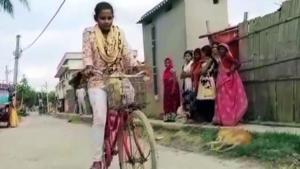 The 15-year-old girl who won praise for carrying her injured father hundreds of miles across India by bike said on Wednesday she never thought of giving up after promising her mother she would get him home safely.(ANI) The 15-year-old girl who won praise for carrying her injured father hundreds of miles across India by bike said on Wednesday she never thought of giving up after promising her mother she would get him home safely.(ANI)