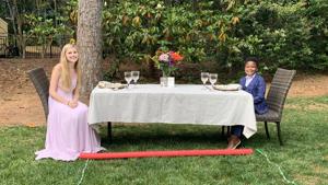 He planned a socially distant prom, complete with her favorite food. There was dancing too.(Twitter/@bhchapman) He planned a socially distant prom, complete with her favorite food. There was dancing too.(Twitter/@bhchapman)