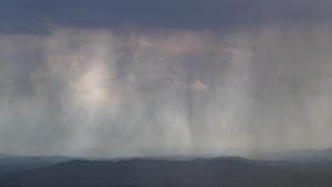 Dark clouds and rain streaks are seen above Kangra Valley in Dharmsala, on Thursday. The Himalayan region saw some strong winds and heavy rain.(AP Photo) Dark clouds and rain streaks are seen above Kangra Valley in Dharmsala, on Thursday. The Himalayan region saw some strong winds and heavy rain.(AP Photo)
