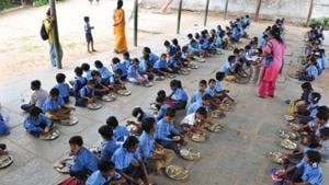 Children being served mid-day meals at a government school.(HT FILE PHOTO) Children being served mid-day meals at a government school.(HT FILE PHOTO)