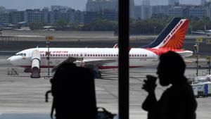 A passengers sips a drink in the food court.(AFP file photo) A passengers sips a drink in the food court.(AFP file photo)