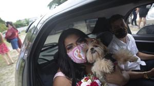 The image shows a newlywed couple Erica da Conceicao and Joao Blank.(AP) The image shows a newlywed couple Erica da Conceicao and Joao Blank.(AP)