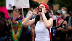 A protester yells during a rally against the death in Minneapolis police custody of George Floyd, in Denver, Colorado, US.(Reuters) A protester yells during a rally against the death in Minneapolis police custody of George Floyd, in Denver, Colorado, US.(Reuters)
