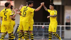 Borussia Dortmund's Jadon Sancho celebrates scoring their third goal with teammates, as play resumes behind closed doors following the outbreak of the coronavirus disease (COVID-19) Lars Baron/Pool via REUTERS(REUTERS) Borussia Dortmund's Jadon Sancho celebrates scoring their third goal with teammates, as play resumes behind closed doors following the outbreak of the coronavirus disease (COVID-19) Lars Baron/Pool via REUTERS(REUTERS)