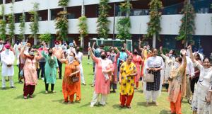 Parents protesting on Monday outside Guru Nanak Public School (GNPS), Model Town Extension, Ludhiana, against the transfer of their children here from GNPS Birmi.(Gurpreet Singh/Hindustan Times) Parents protesting on Monday outside Guru Nanak Public School (GNPS), Model Town Extension, Ludhiana, against the transfer of their children here from GNPS Birmi.(Gurpreet Singh/Hindustan Times)