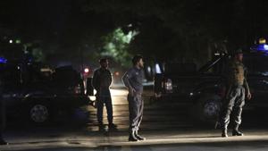 Afghan police arrive at the site of a bombing in a mosque in Kabul, Afghanistan.(AP) Afghan police arrive at the site of a bombing in a mosque in Kabul, Afghanistan.(AP)