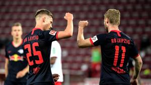 Leipzig's Dani Olmo celebrates scoring their fourth goal with Timo Werner.(REUTERS) Leipzig's Dani Olmo celebrates scoring their fourth goal with Timo Werner.(REUTERS)