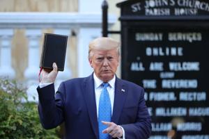 US President Donald Trump holds up a Bible during a photo opportunity in front of St. John's Episcopal Church in the midst of ongoing protests over racial inequality in the wake of the death of George Floyd while in Minneapolis police custody, outside the White House in Washington, US.(REUTERS) US President Donald Trump holds up a Bible during a photo opportunity in front of St. John's Episcopal Church in the midst of ongoing protests over racial inequality in the wake of the death of George Floyd while in Minneapolis police custody, outside the White House in Washington, US.(REUTERS)