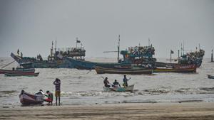 Fishing boats seen anchored at a shore following a warning by Indian Meteorological Department (IMD) for fishermen not to enter the Arabian Sea for the next two days as a precaution against cyclone 'Nisarga'.(PTI photo) Fishing boats seen anchored at a shore following a warning by Indian Meteorological Department (IMD) for fishermen not to enter the Arabian Sea for the next two days as a precaution against cyclone 'Nisarga'.(PTI photo)