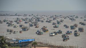 Fishing boats seen anchored at a shore following a warning by Indian Meteorological Department (IMD) for fishermen not to enter the Arabian Sea for the next two days as a precaution against Cyclone Nisarga, at Uttan beach in Thane on Monday.(PTI Photo) Fishing boats seen anchored at a shore following a warning by Indian Meteorological Department (IMD) for fishermen not to enter the Arabian Sea for the next two days as a precaution against Cyclone Nisarga, at Uttan beach in Thane on Monday.(PTI Photo)