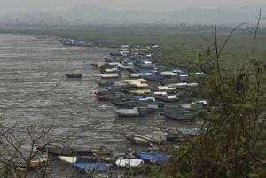 Fisherman parked their boats at the bay in Bhayandar as Cyclone Nisarga is about to hit the western shore in Mumbai on Tuesday.(Hindustan Times) Fisherman parked their boats at the bay in Bhayandar as Cyclone Nisarga is about to hit the western shore in Mumbai on Tuesday.(Hindustan Times)