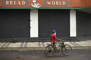 Stay-at-home measures triggered by the coronavirus pandemic has kept most of India’s 1.3 billion population indoors since late March, leading to a collapse in business activities.(AP) Stay-at-home measures triggered by the coronavirus pandemic has kept most of India’s 1.3 billion population indoors since late March, leading to a collapse in business activities.(AP)